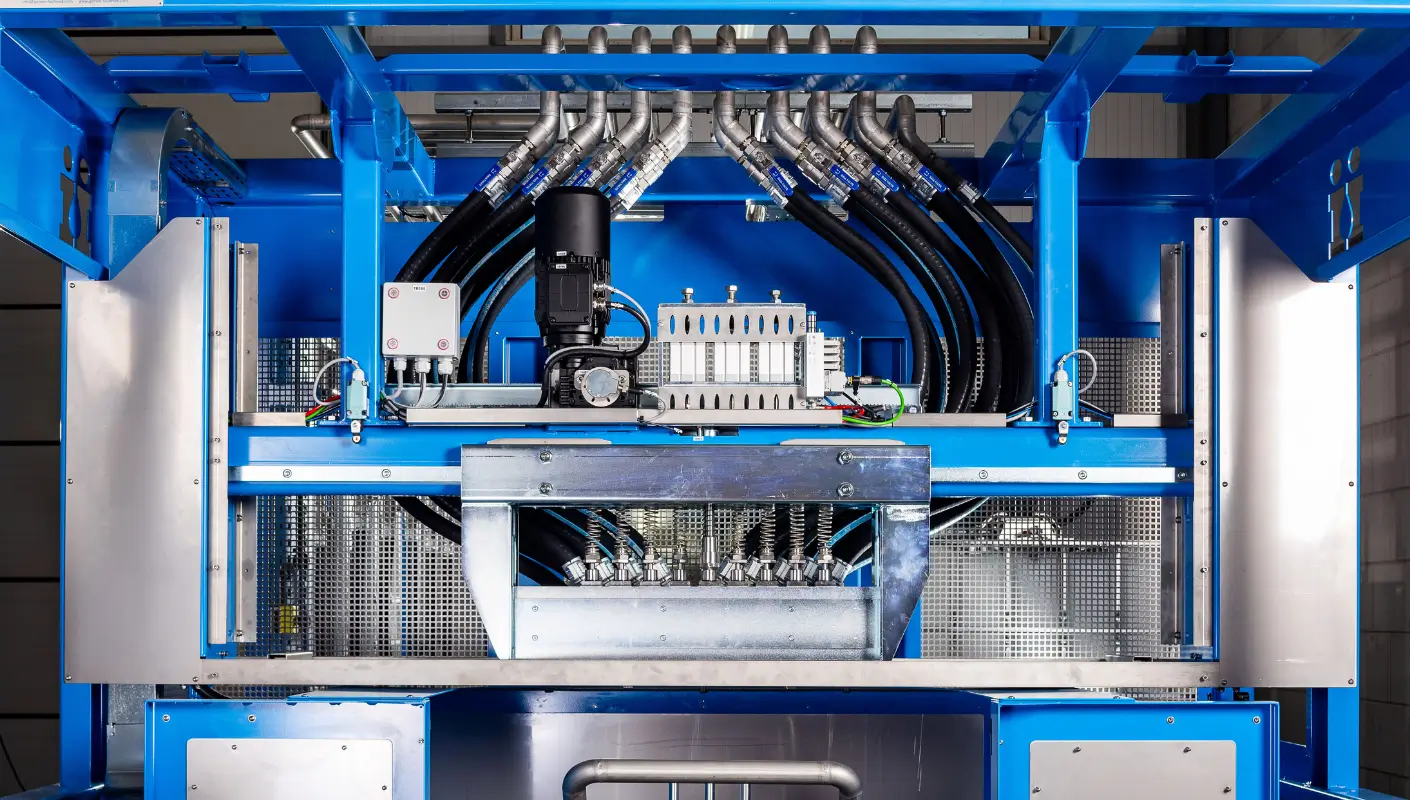 Precision dosing heads of a custom-made dispensing machine by Gemini Techniek, designed for accurate and efficient dispensing in the paint and coatings industry.